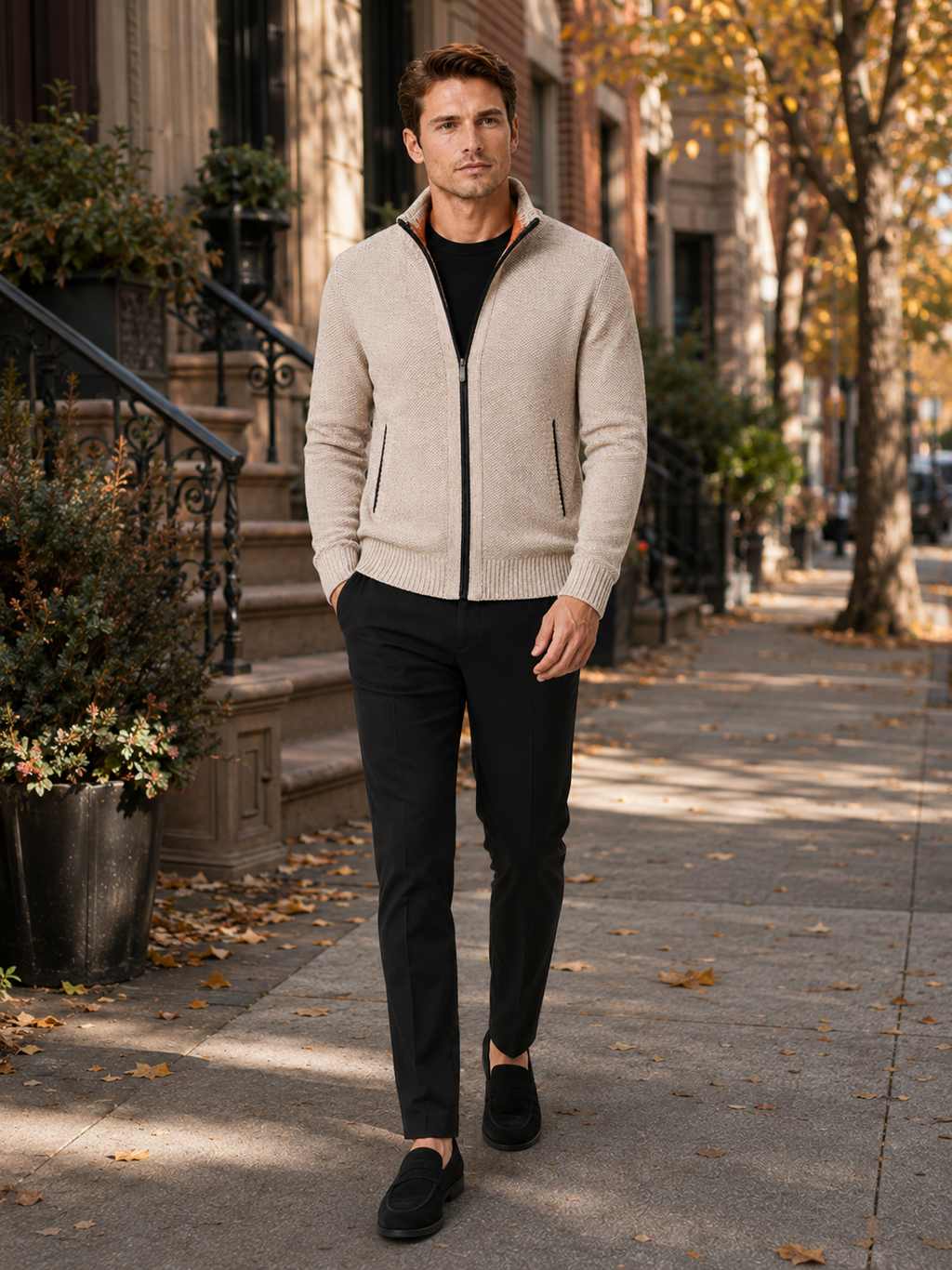 Man styling beige fleece cardigan sweater in a refined everyday winter lifestyle outfit