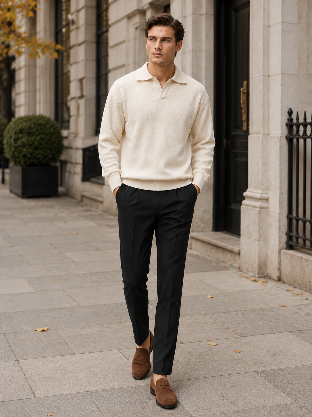 Man styling beige knit polo sweater in a refined business casual and everyday lifestyle outfit