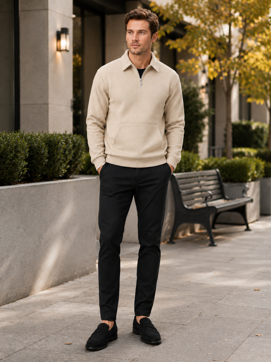 Man styling beige quarter zip sweater in a relaxed outdoor and everyday lifestyle outfit