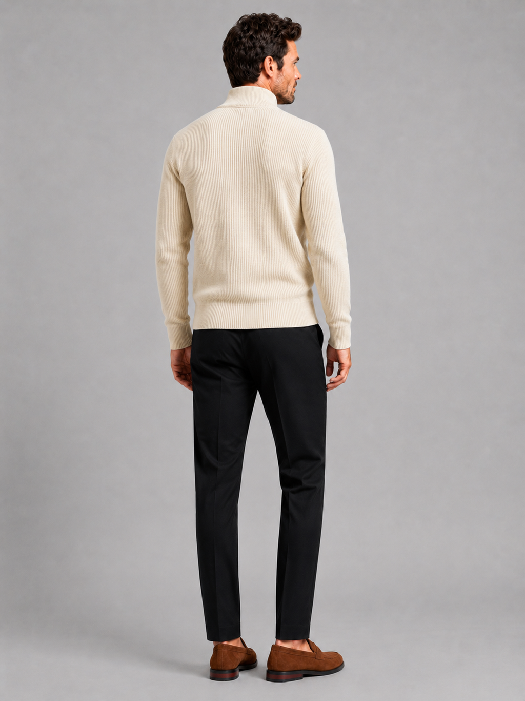Back view of a man wearing a beige ribbed knit cardigan showing the slim fit, long sleeves, and textured knit construction