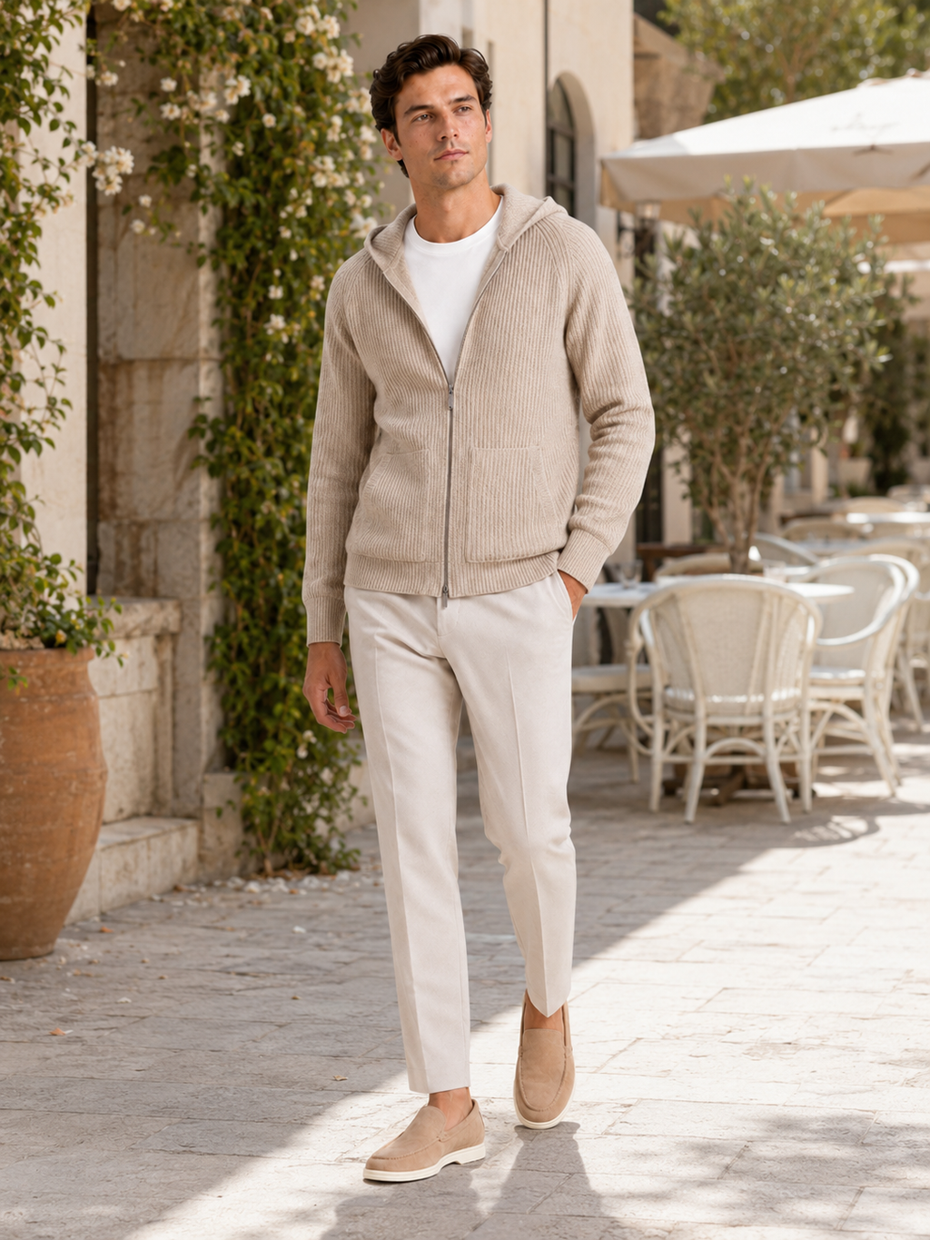 Man styling beige merino wool zip hoodie cardigan in a refined fall winter lifestyle outfit