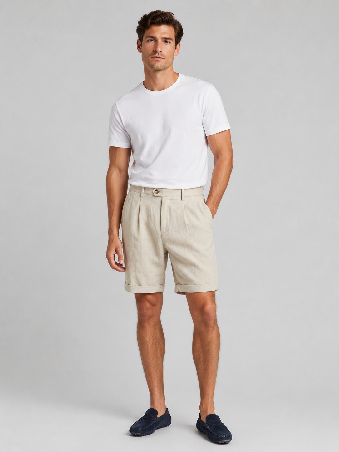 Men wearing beige pleated linen blend shorts tailored fit lightweight breathable summer style
