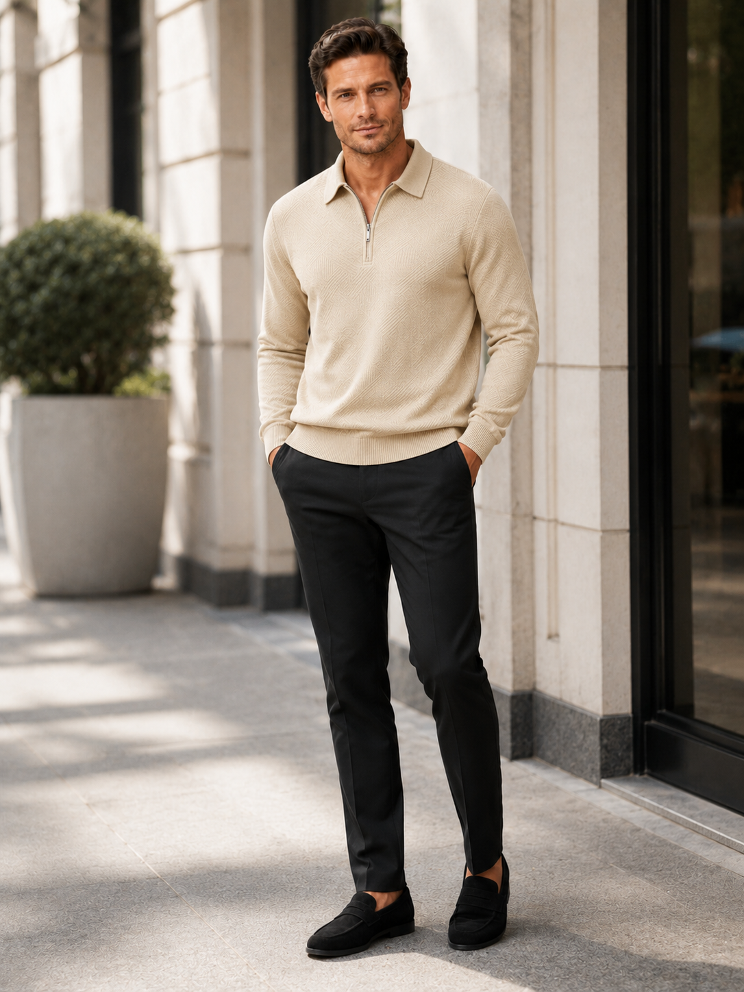 Man wearing a beige lightweight quarter zip polo sweater in a refined everyday fall winter outfit