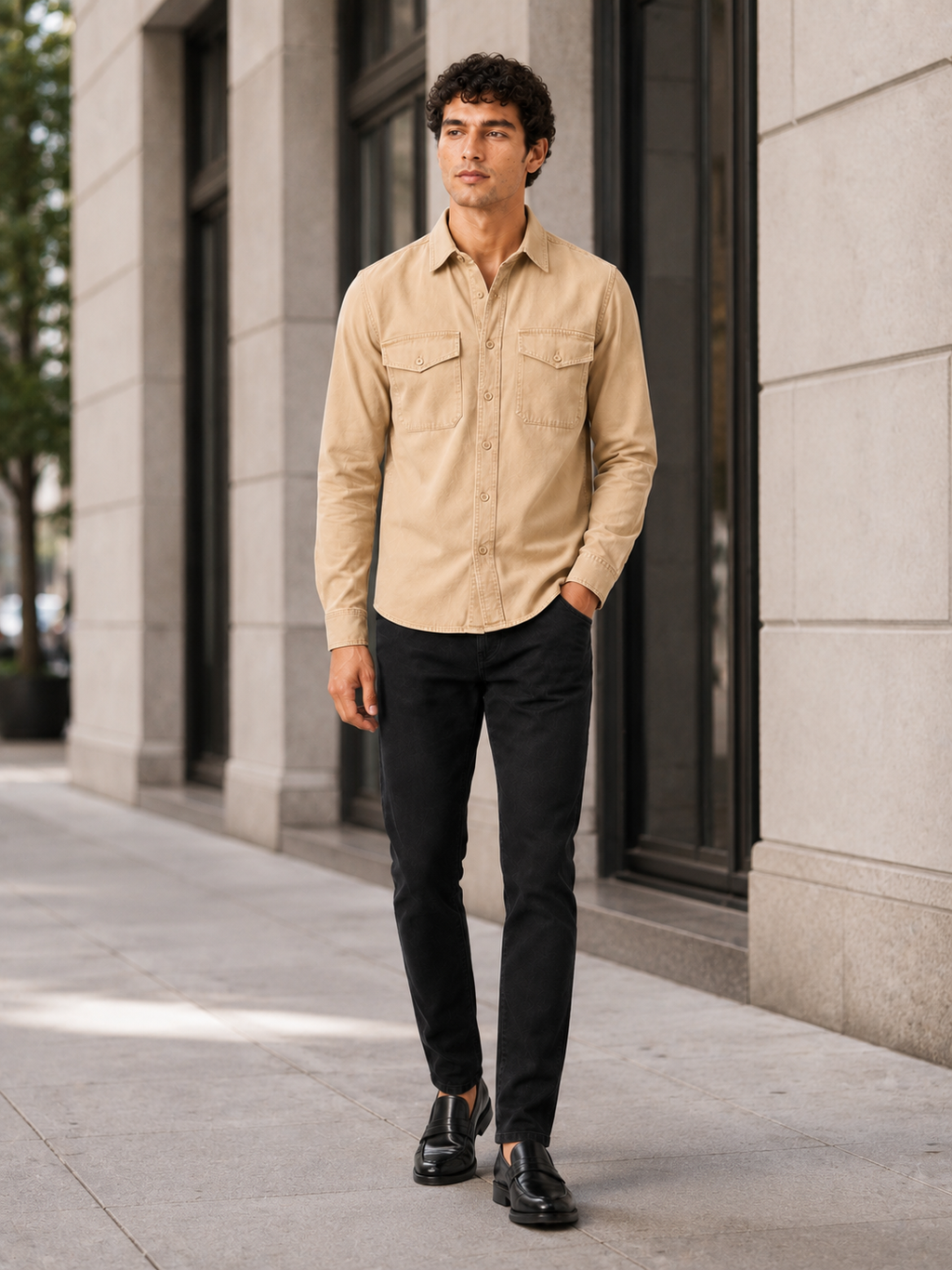 Man styling beige double pocket work shirt in a relaxed casual everyday outfit