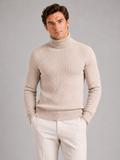 Men wearing beige cable knit turtleneck sweater slim fit heavyweight winter casual style