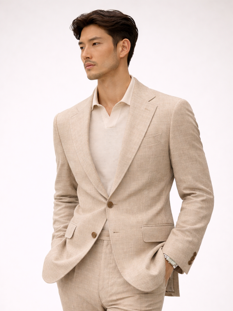 Man wearing beige lightweight breathable tailored summer blazer for wedding, casual and business wear.