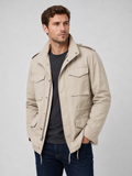 Men wearing beige military field jacket 100 percent cotton multi pocket zip up fall outdoor style