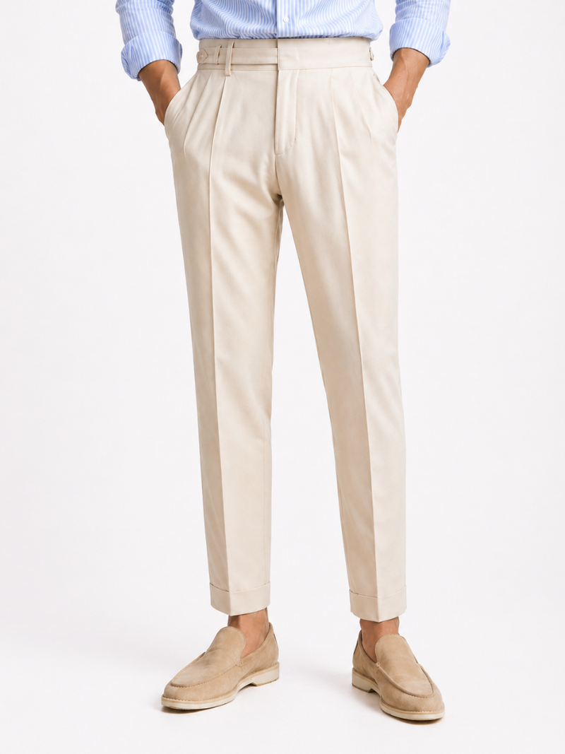 Men wearing beige high waisted pants with belt and button detail tailored fit smart casual style