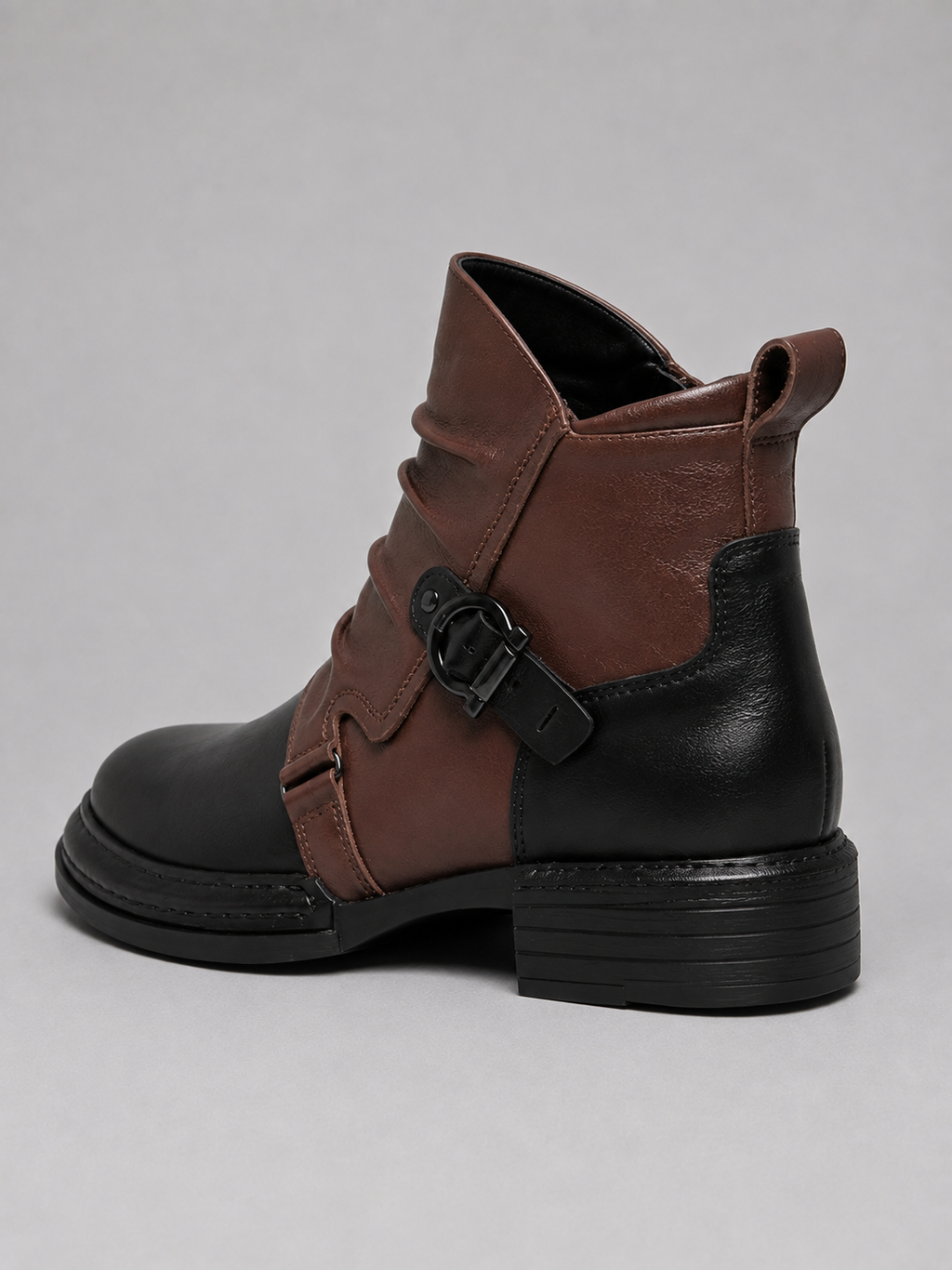 Back view black leather ankle boots showing the rear design, ankle support, heel, and durable outsole