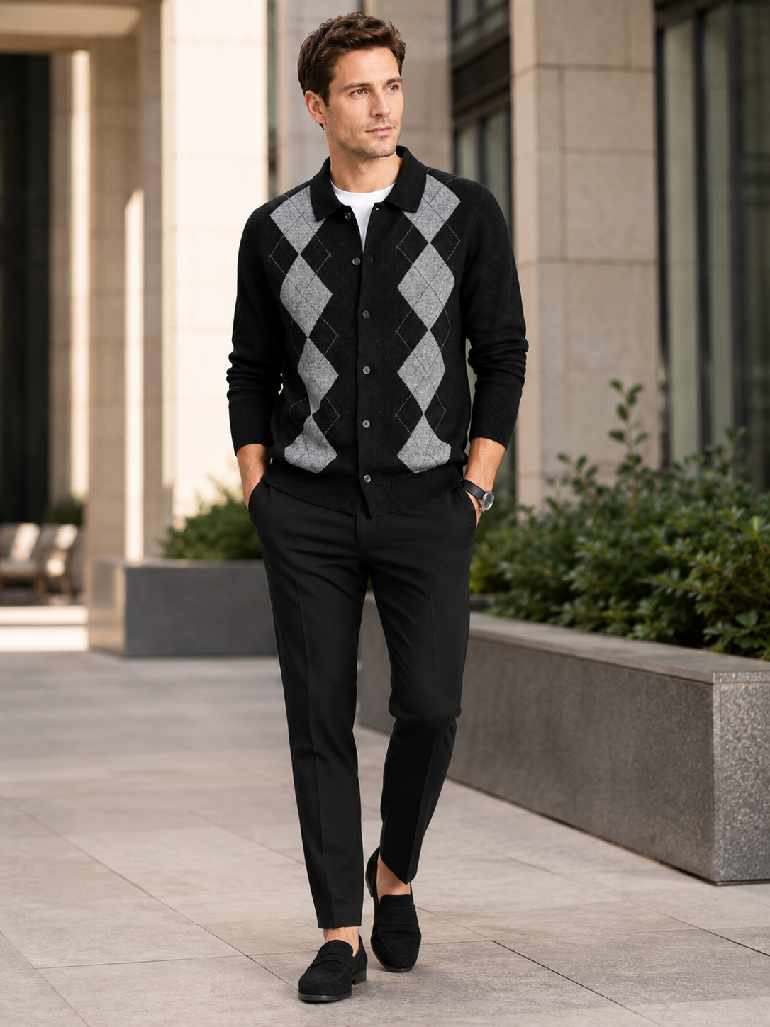 Man wearing a beige argyle button-down cardigan sweater as a refined business casual fall winter layer