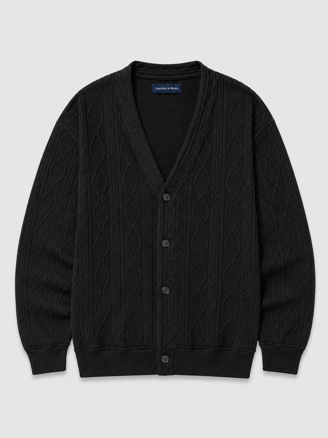 Black men’s cable knit cardigan sweater with a V-neck, diamond pattern, and oversized silhouette displayed on a plain background