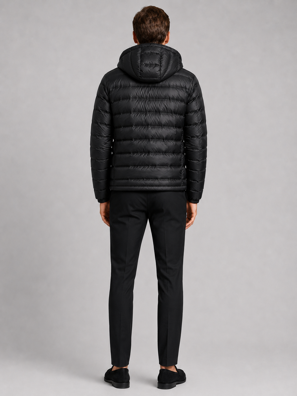 Men’s black hooded puffer jacket comfortable insulated outerwear for hiking, travel, and casual outfits