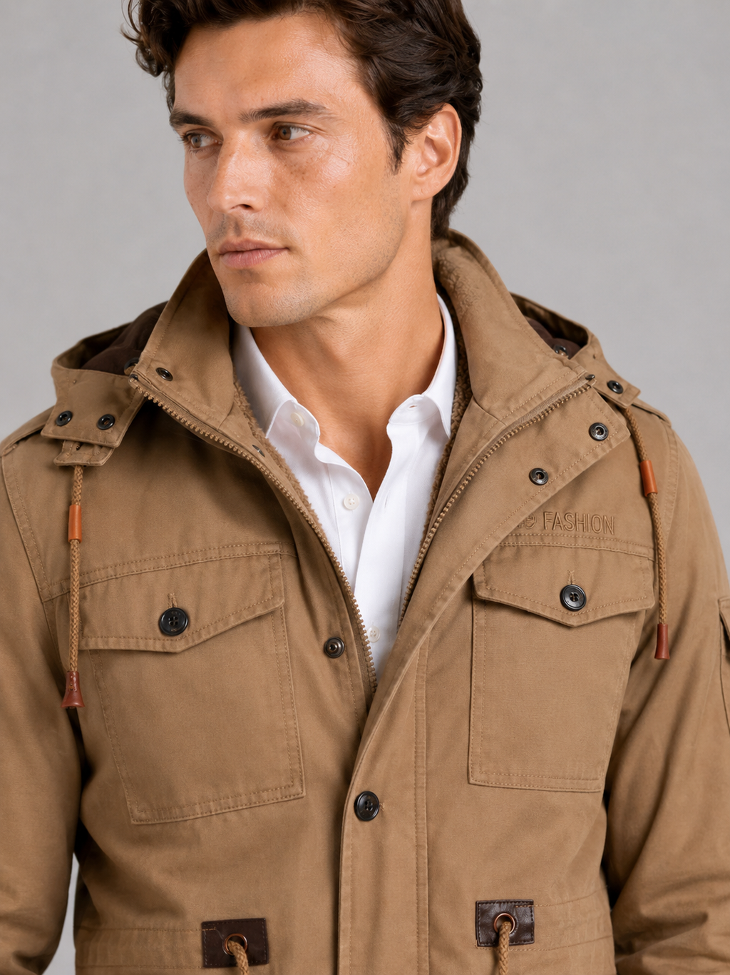 Close up of khaki cotton jacket showing soft fleece lining and durable zipper detail