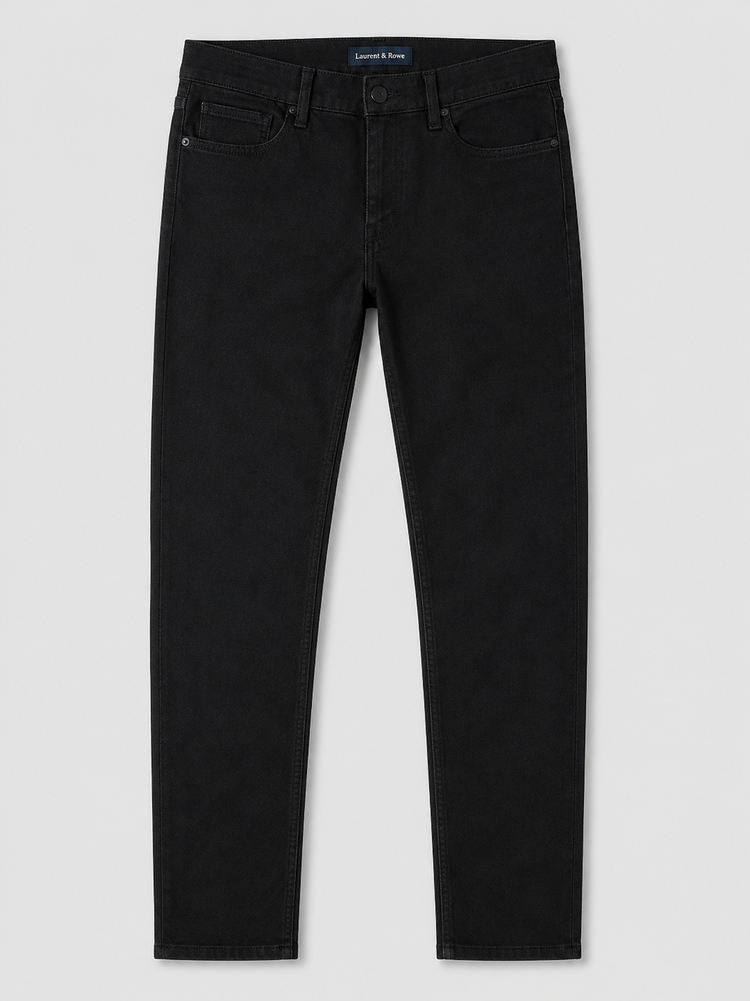 Black men’s stretch denim jeans with a slim fit displayed on a plain background