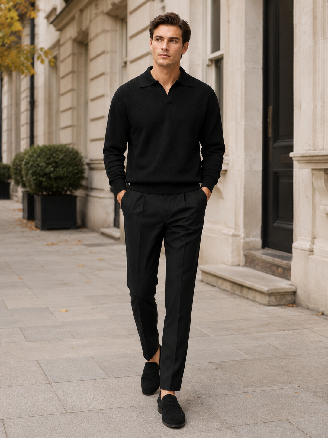 Man styling black knit polo sweater in a modern business casual and everyday lifestyle outfit