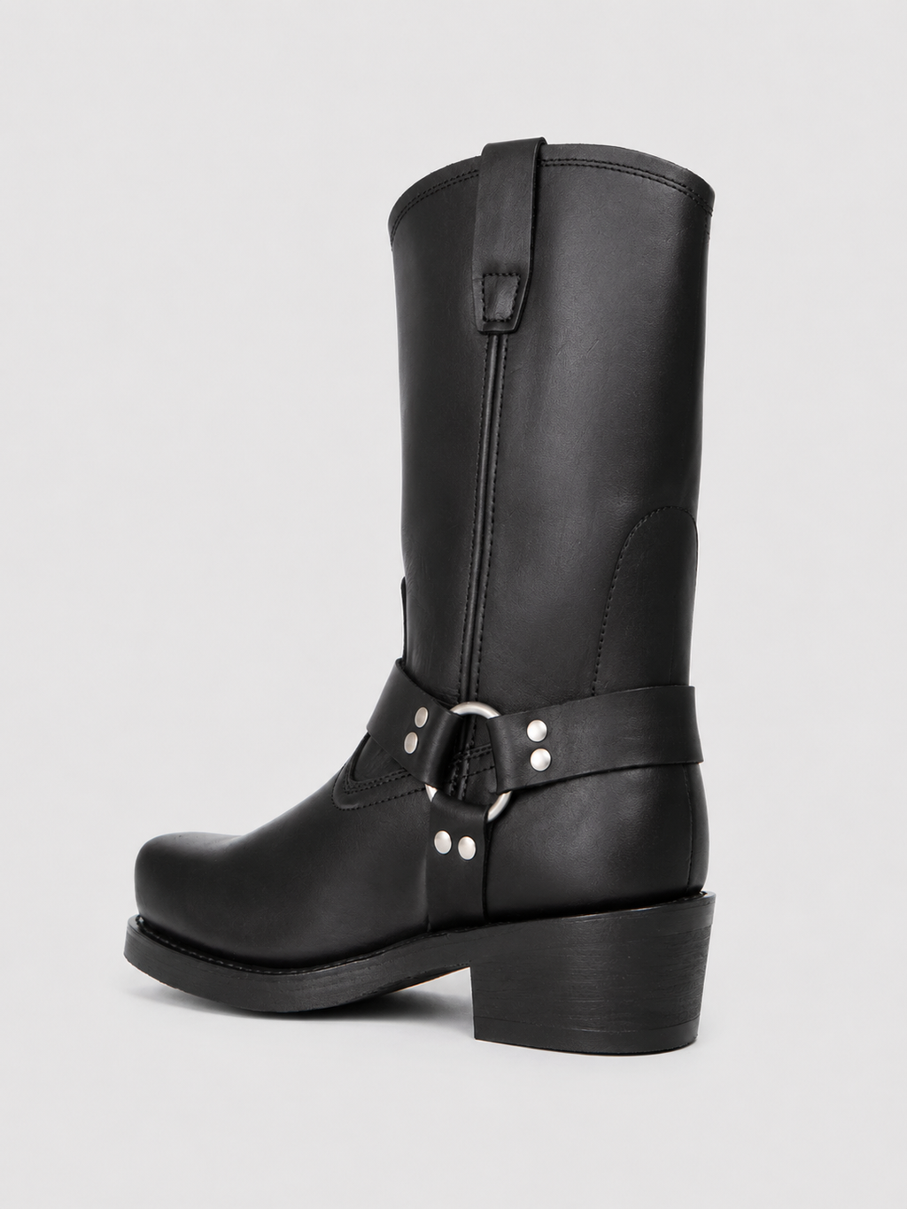 Back view of black men’s mid calf cowboy boots showing the pull tabs, mid calf shaft, heel, and durable rubber outsole