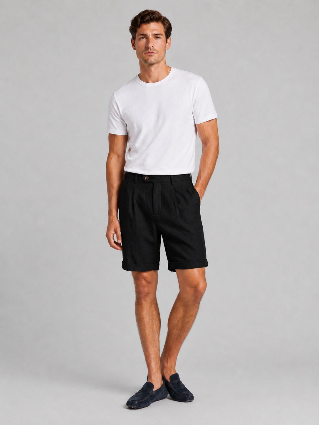 Men wearing black pleated linen blend shorts tailored fit lightweight breathable summer style