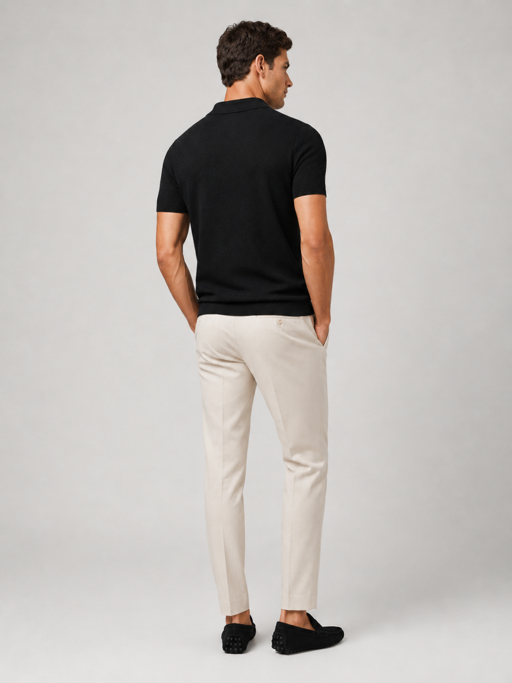 Men’s black breathable knit polo shirt soft stretch fabric for smart casual outfits