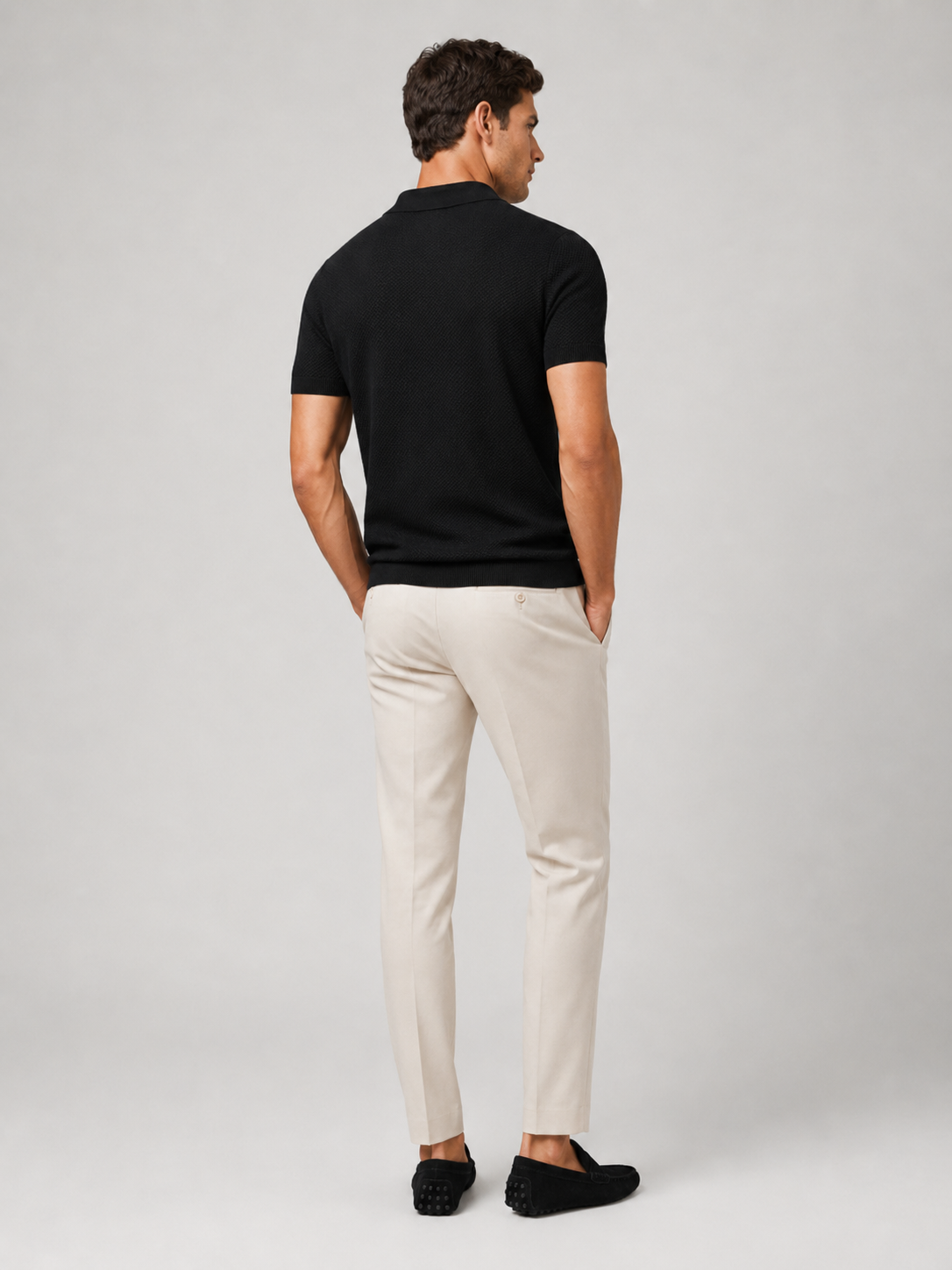Men’s black breathable knit polo shirt soft stretch fabric for smart casual outfits