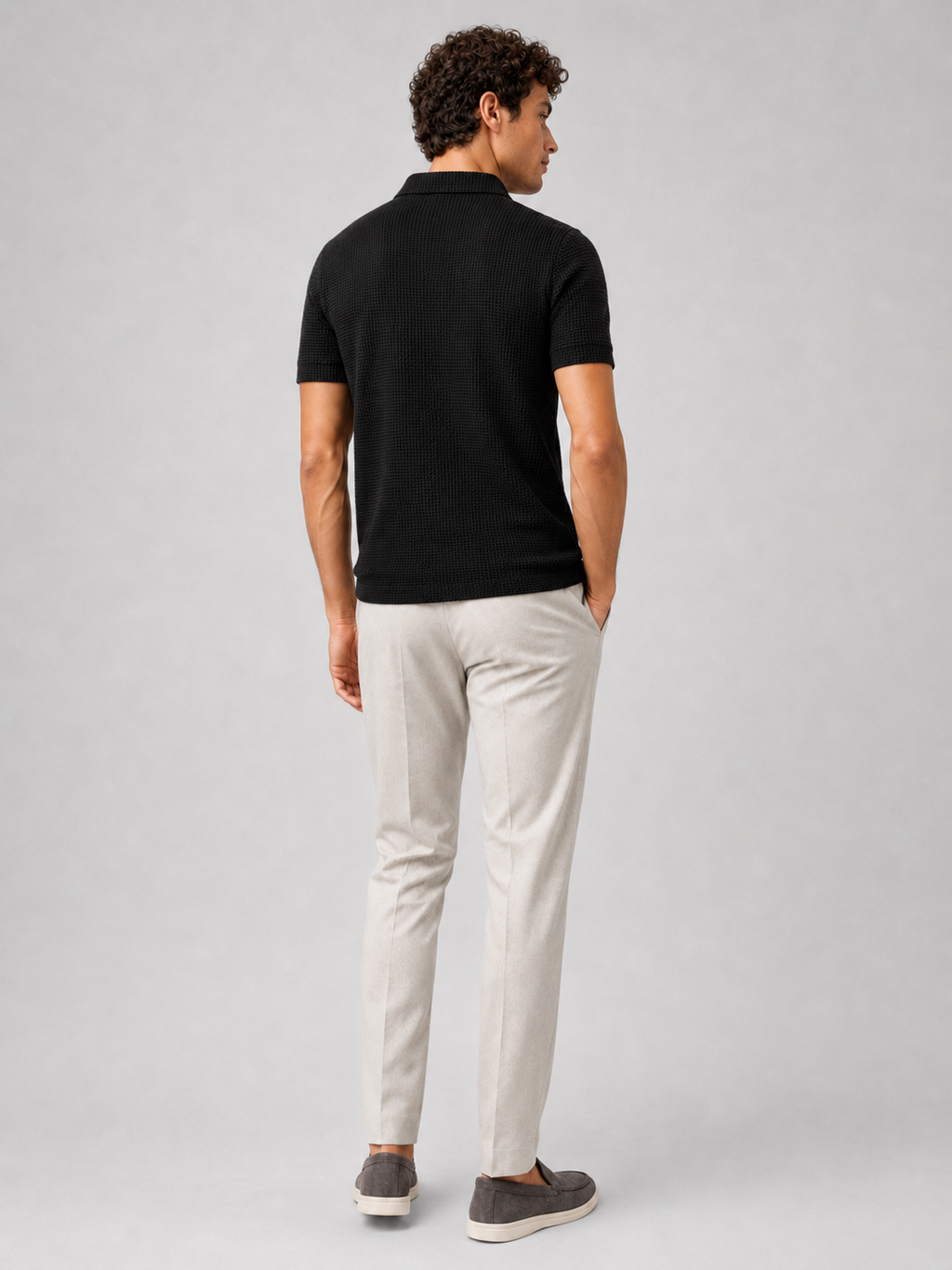 Black textured knit polo shirt for men lightweight breathable smart casual everyday outfit