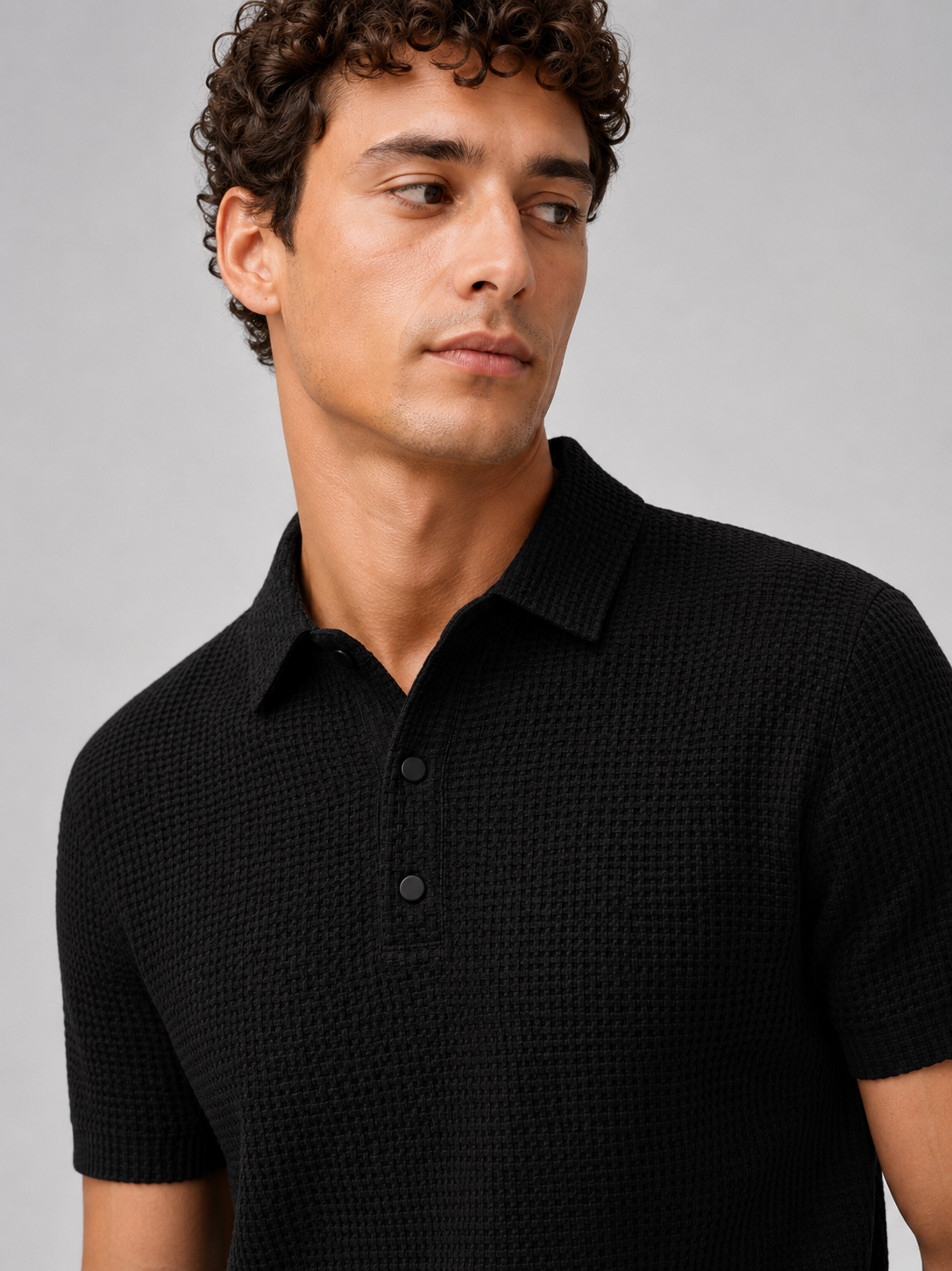 Men’s black short sleeve knit polo with button placket refined summer business casual wear