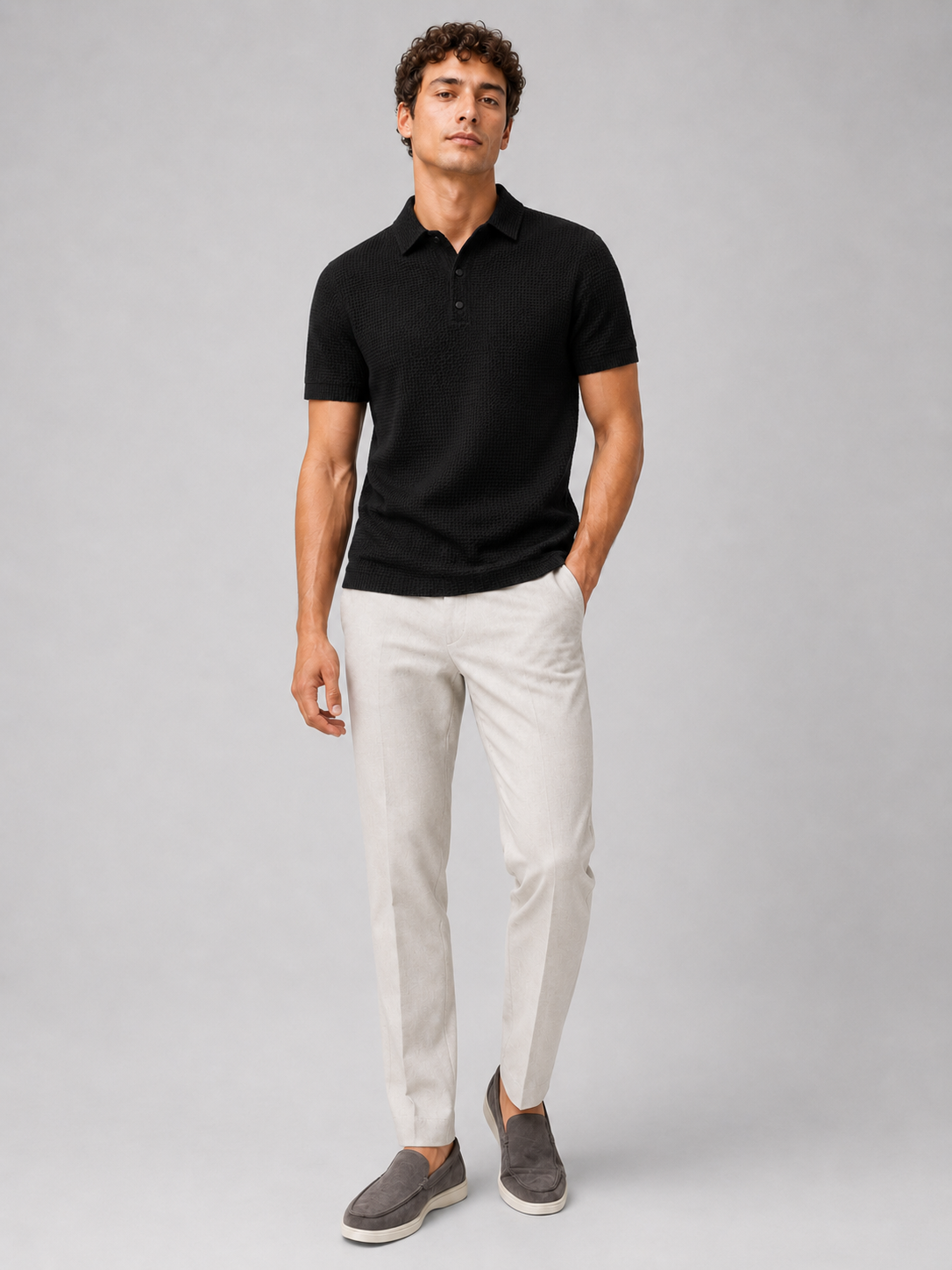 Black lightweight textured polo shirt minimal modern top for smart casual style