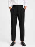 Men wearing black high waisted pants with belt and button detail tailored fit smart old money style