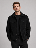 Men wearing black corduroy jacket lapel loose fit fall casual streetwear style