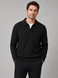 Front view of a man wearing a black heavyweight knit Johnny collar sweater with long sleeves