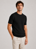 Men wearing black knit t shirt lightweight breathable modern quiet luxury summer style