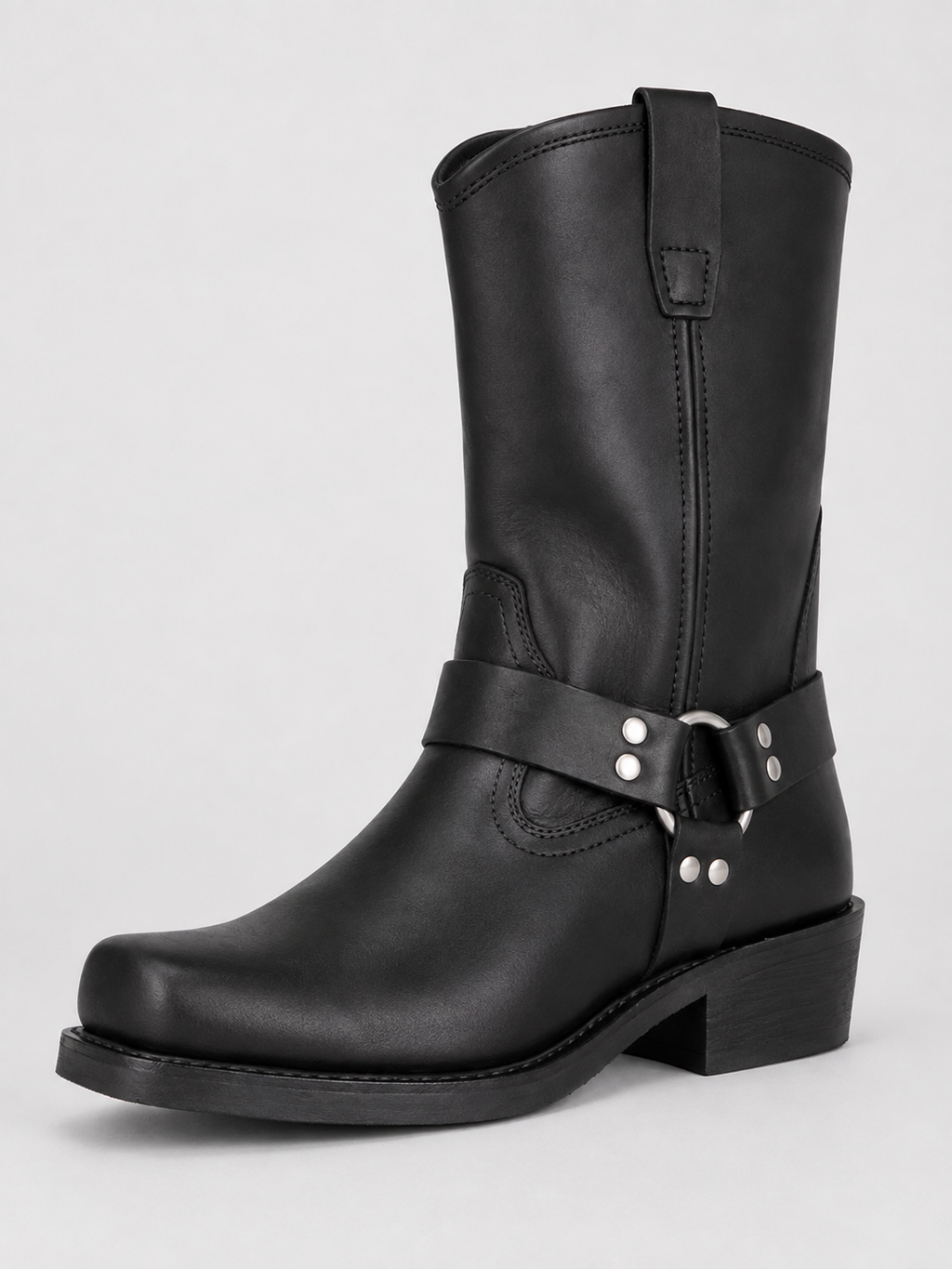 Angled view of black men’s mid calf cowboy boots with a leather upper, slip-on design, western style, and durable outsole
