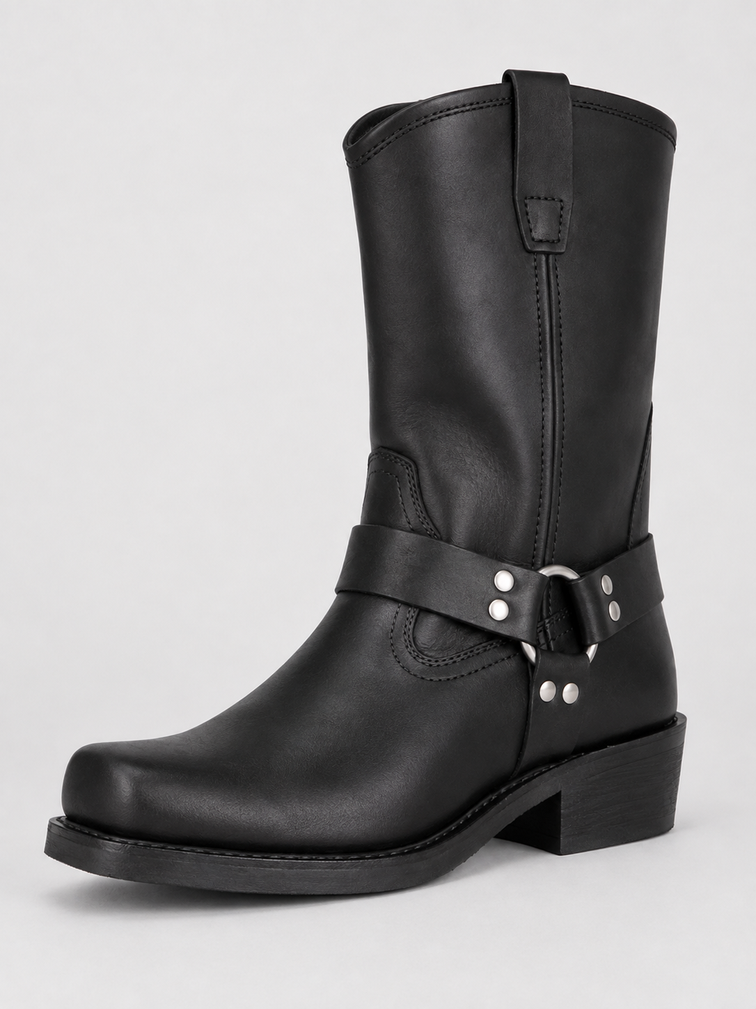Angled view of black men’s mid calf cowboy boots with a leather upper, slip-on design, western style, and durable outsole