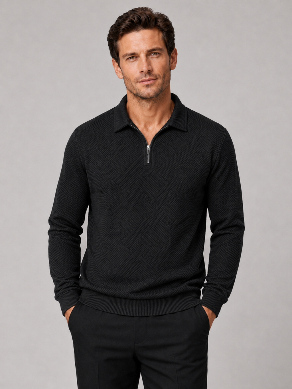 Front view of a man wearing a black lightweight knit quarter zip polo sweater with long sleeves