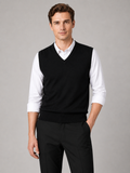 Men wearing black sweater vest v neck solid color knit fall winter business casual style