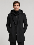 A man wearing a black wool hooded trench coat, warm winter business casual outfit, clean studio background