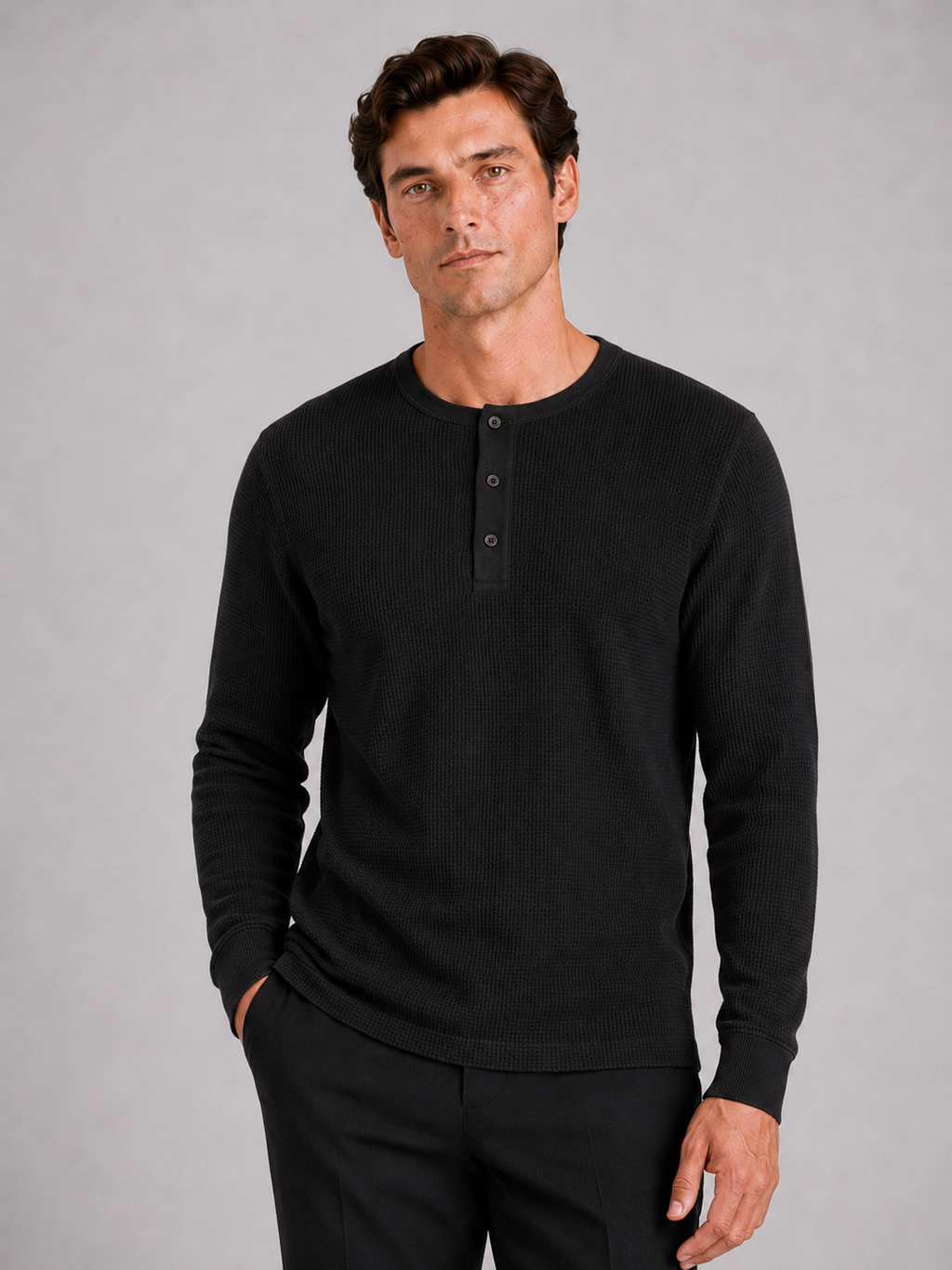 Men wearing black waffle knit henley shirt long sleeve lightweight textured casual style