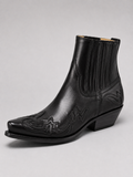 Angled view of black men’s western cowboy boots with embroidered leather, pointed toe, ankle height, and durable outsole