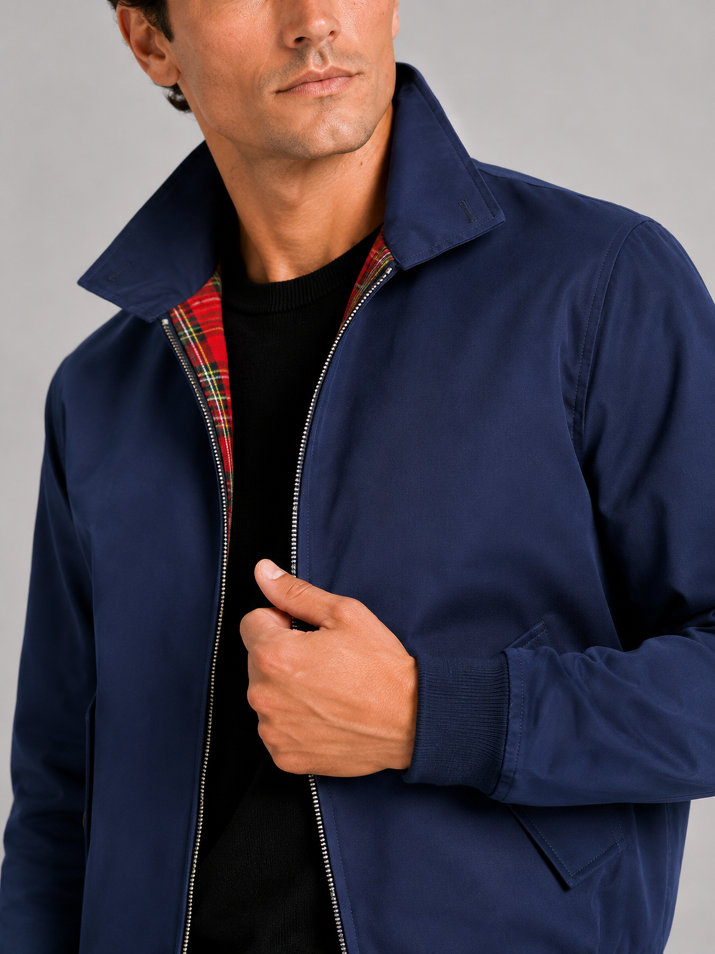 Close up of blue Harrington jacket showing smooth breathable fabric and zipper detail