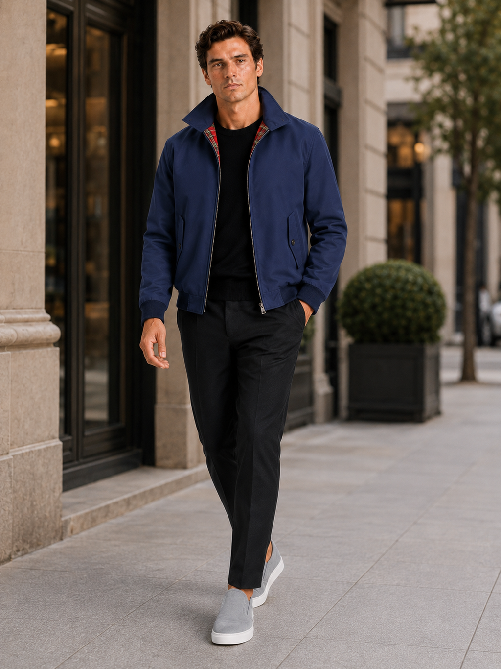 Man styling blue Harrington fall jacket in a clean everyday lifestyle outfit