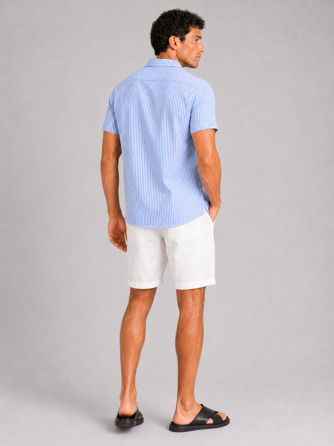 Men’s blue button up seersucker shirt breathable fabric for vacation and coastal outfits