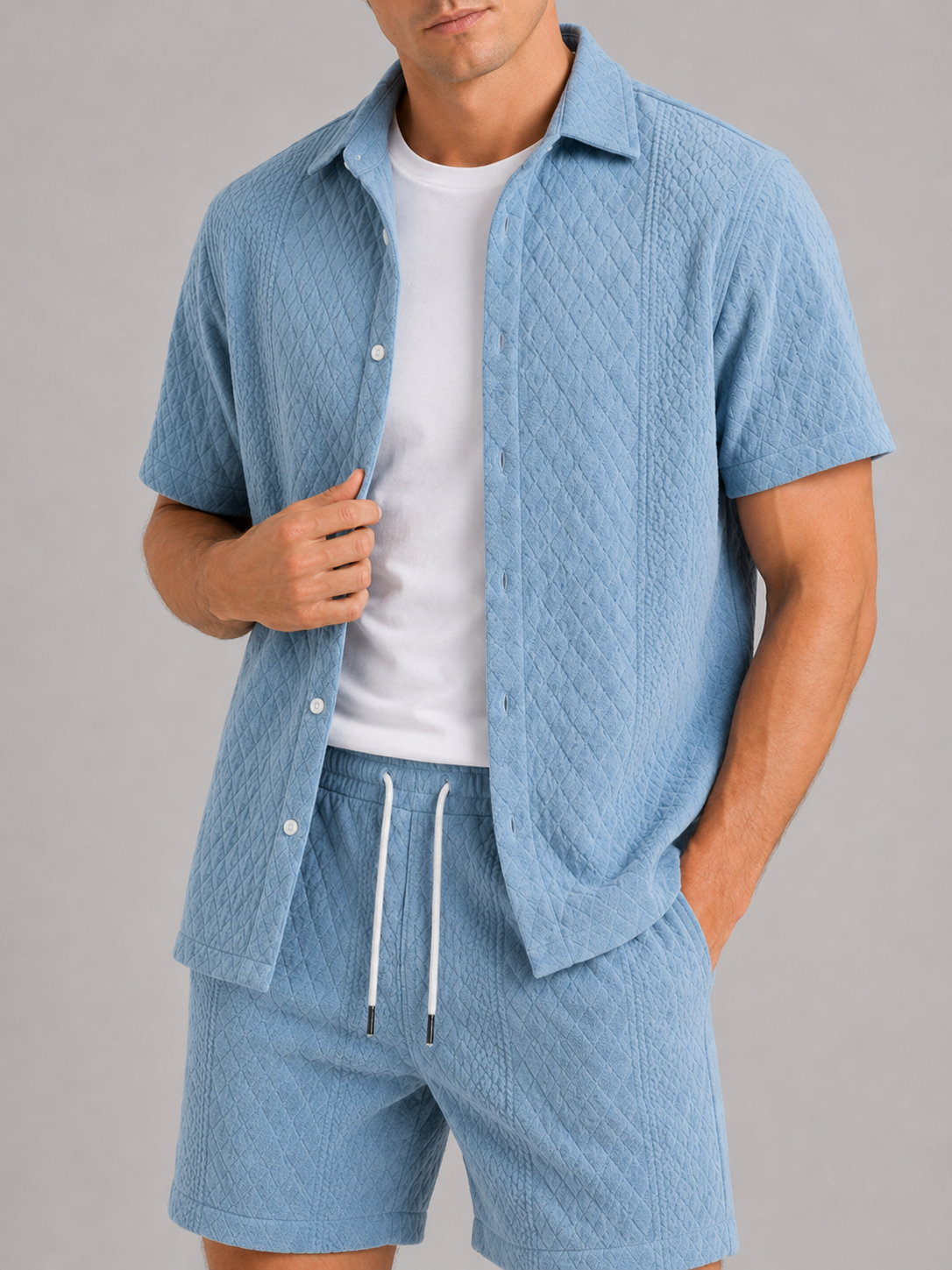 Close up of blue textured two piece set showing lightweight fabric and woven texture detail