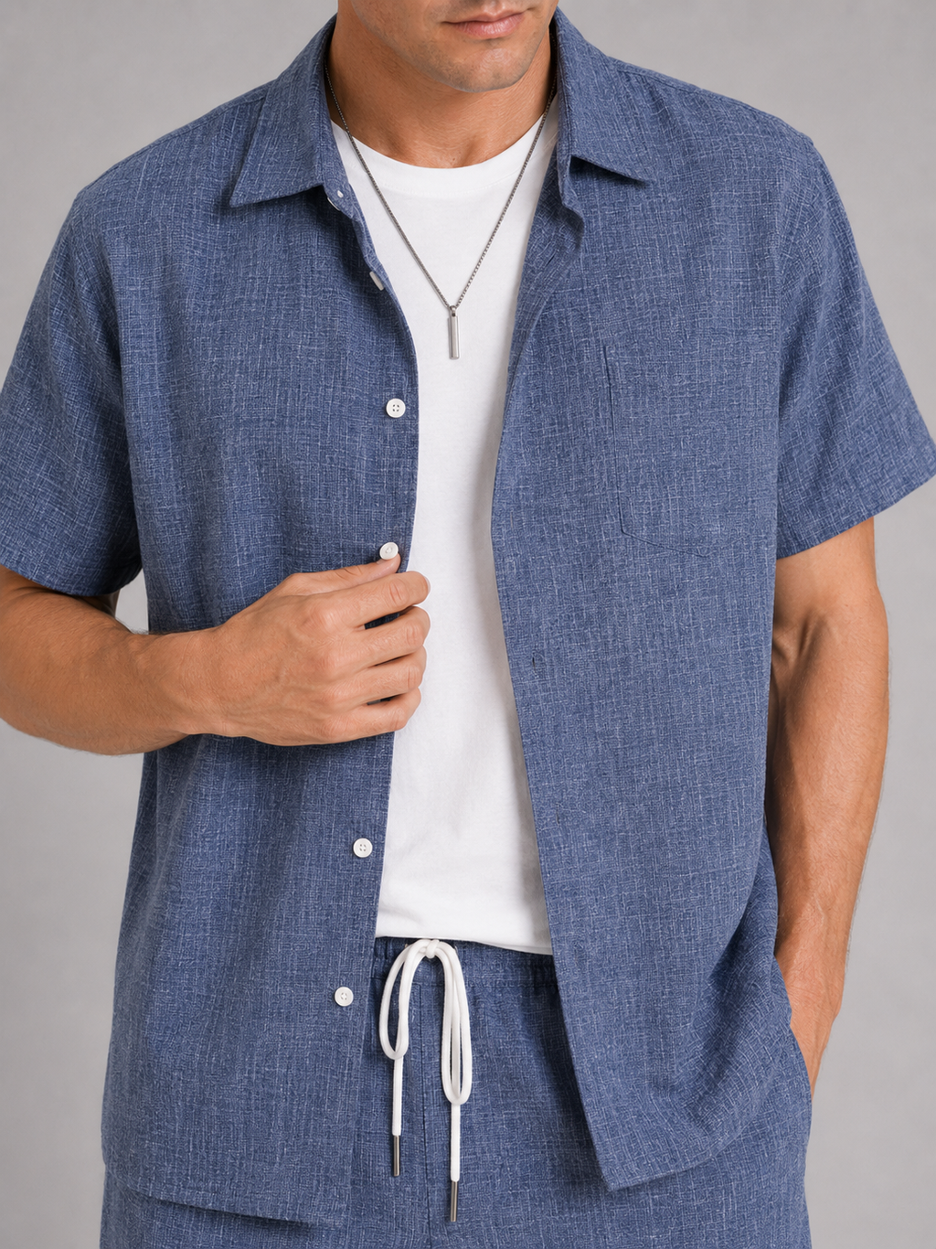 Close up of blue summer set showing lightweight breathable fabric and relaxed fit detail
