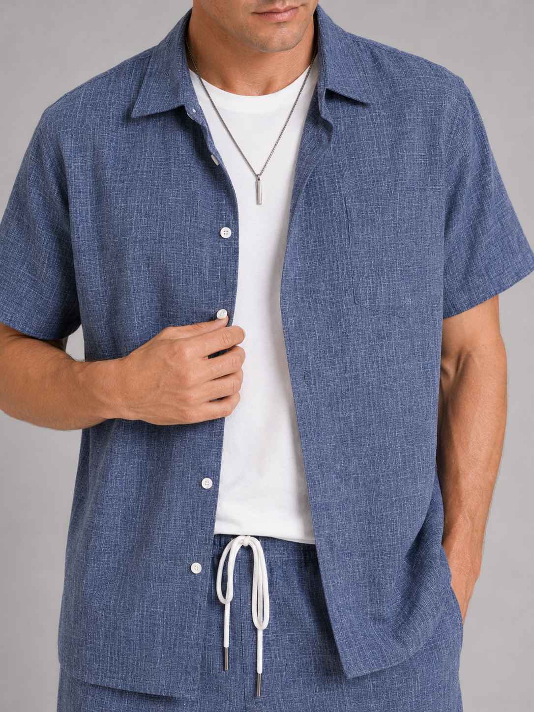 Close up of blue summer set showing lightweight breathable fabric and relaxed fit detail