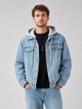 Men wearing blue hooded denim jacket with detachable hood and loose fit winter streetwear style