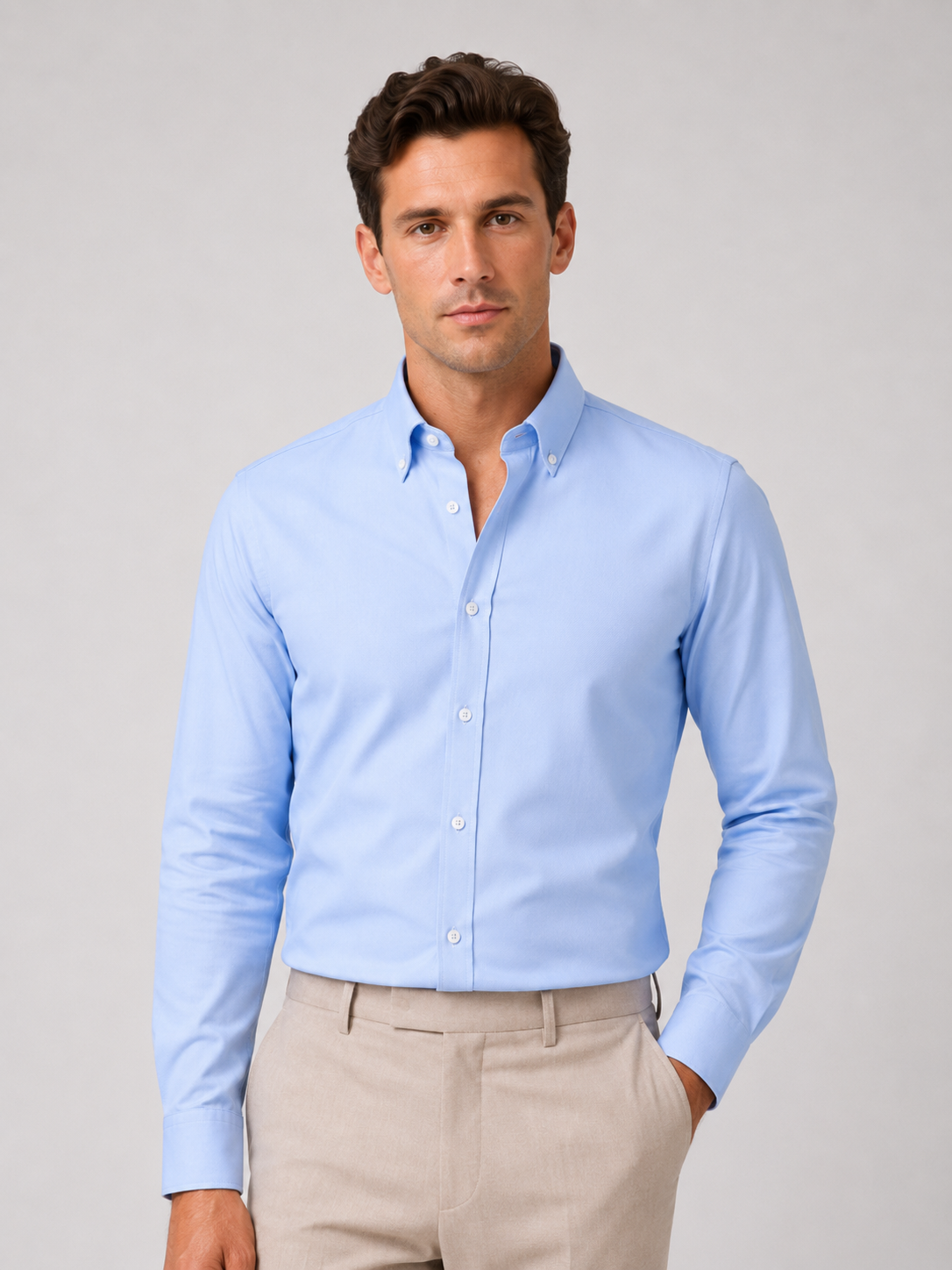 Men wearing blue oxford shirt cotton button up lightweight summer business casual style