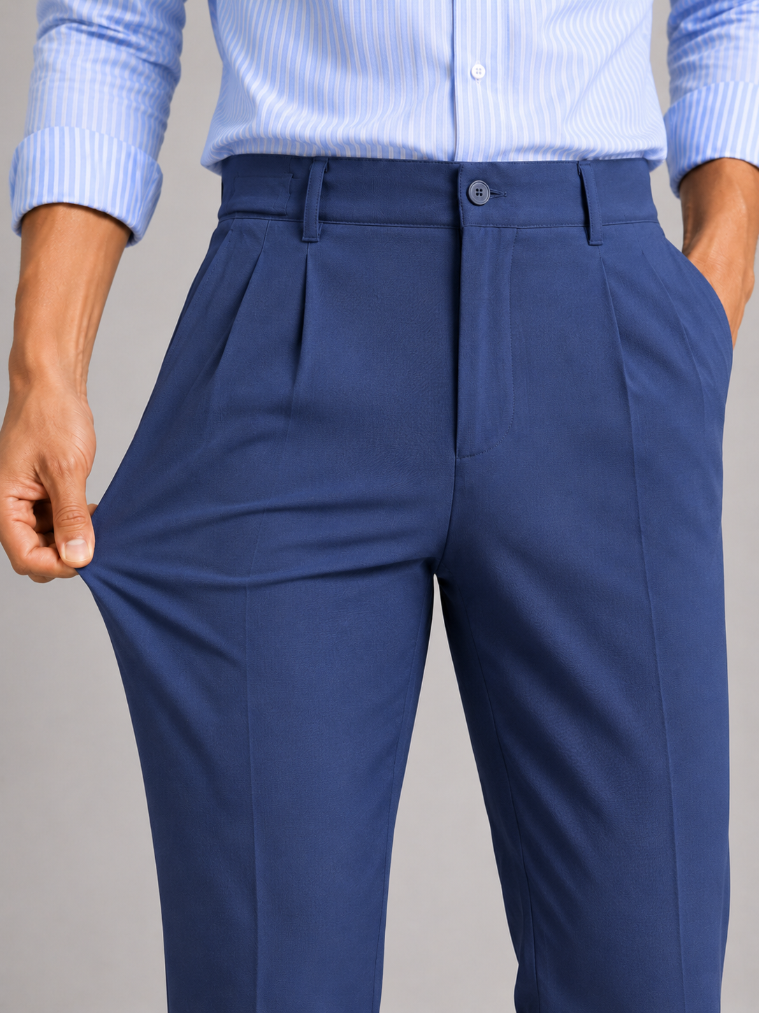 Close up of Blue summer trousers showing lightweight stretch fabric and tailored straight leg detail