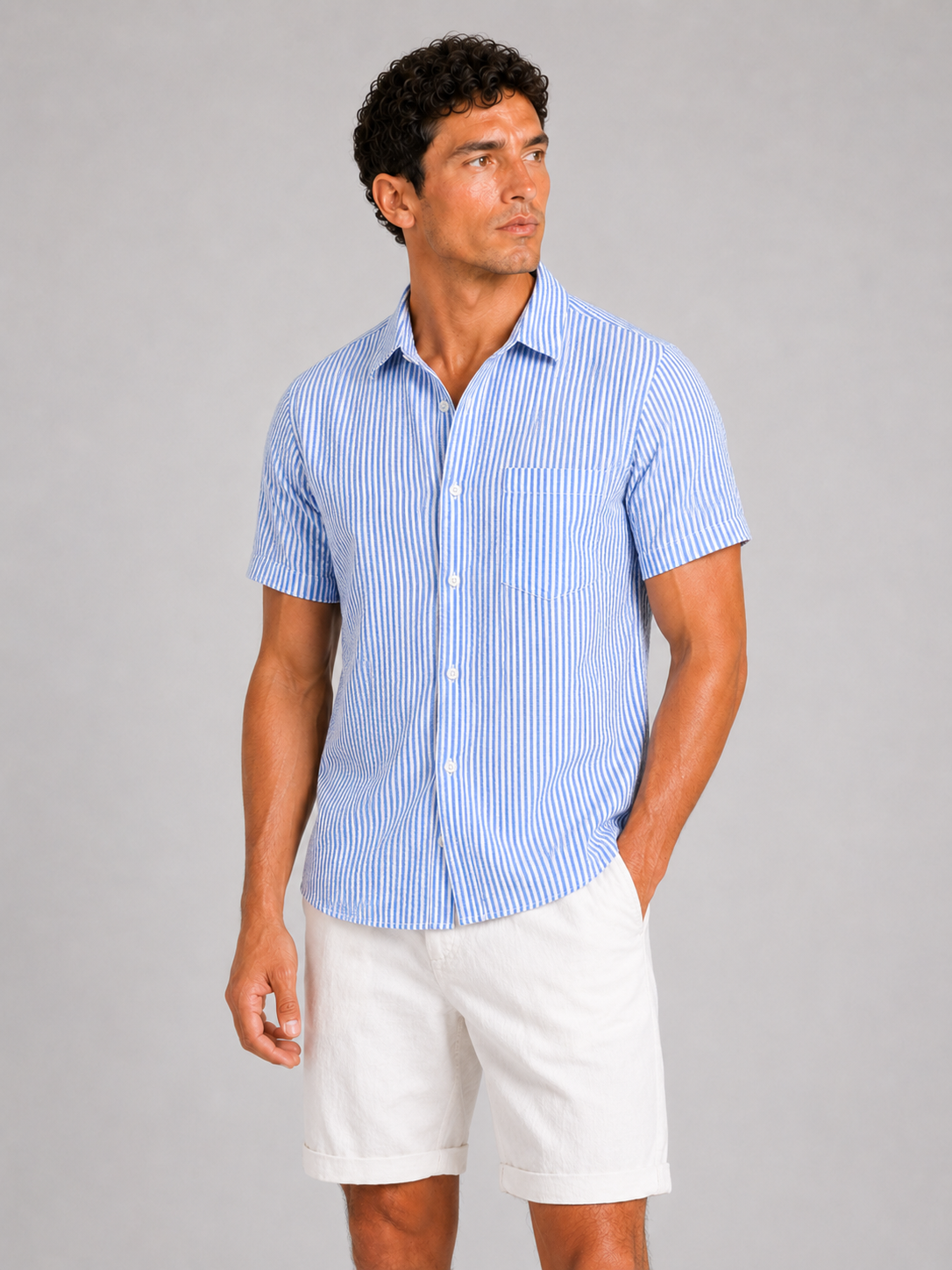 Men wearing blue seersucker striped short sleeve shirt lightweight breathable summer vacation style