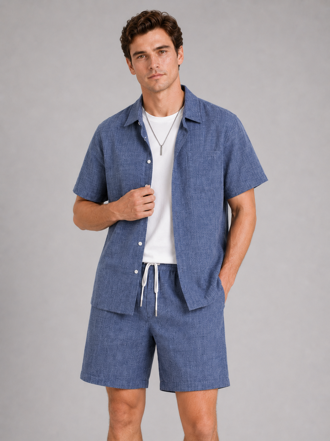 Men wearing blue two piece set short sleeve shirt and shorts breathable summer vacation style