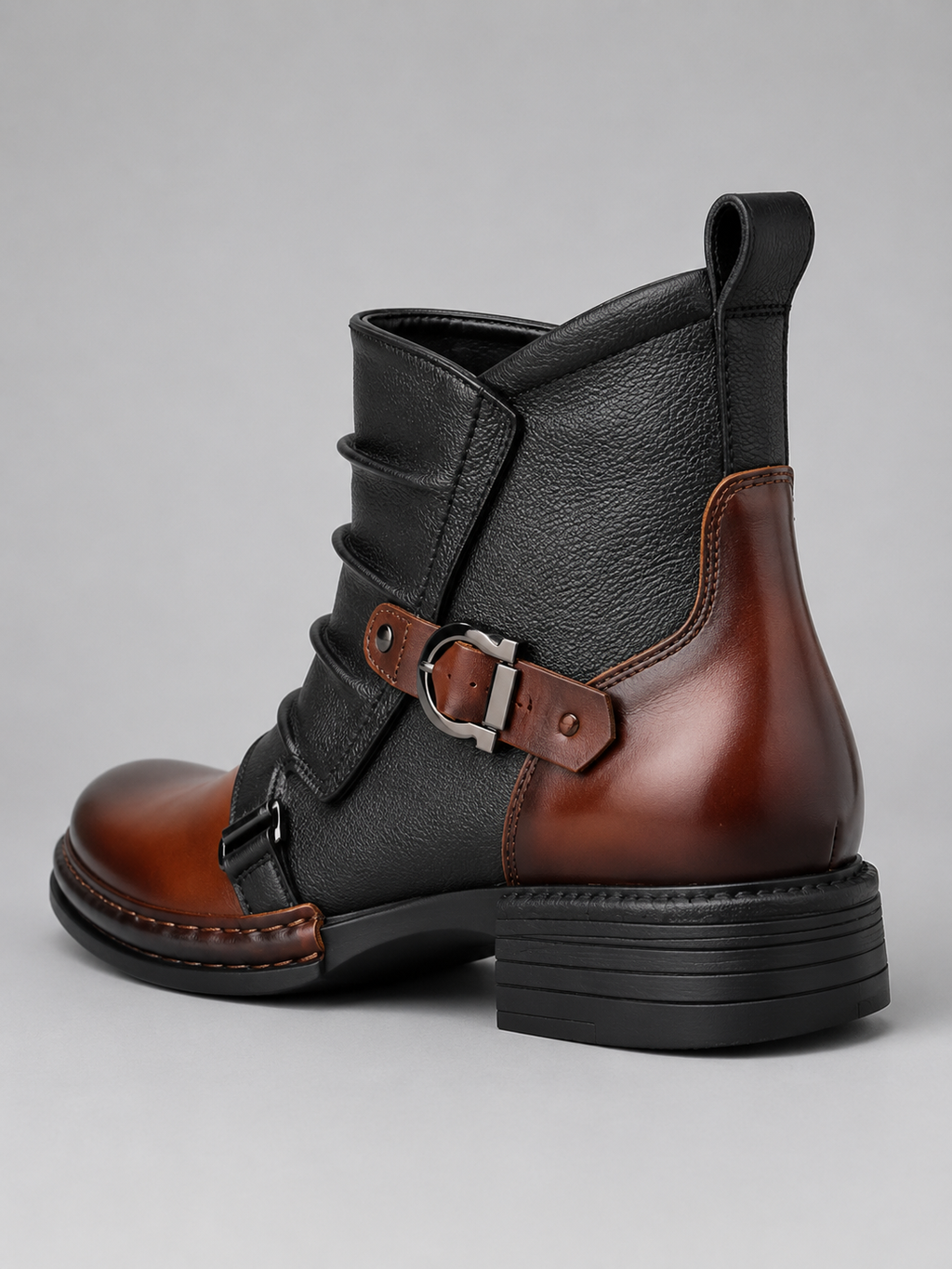 Back view brown leather ankle boots showing the rear design, ankle support, heel, and durable outsole