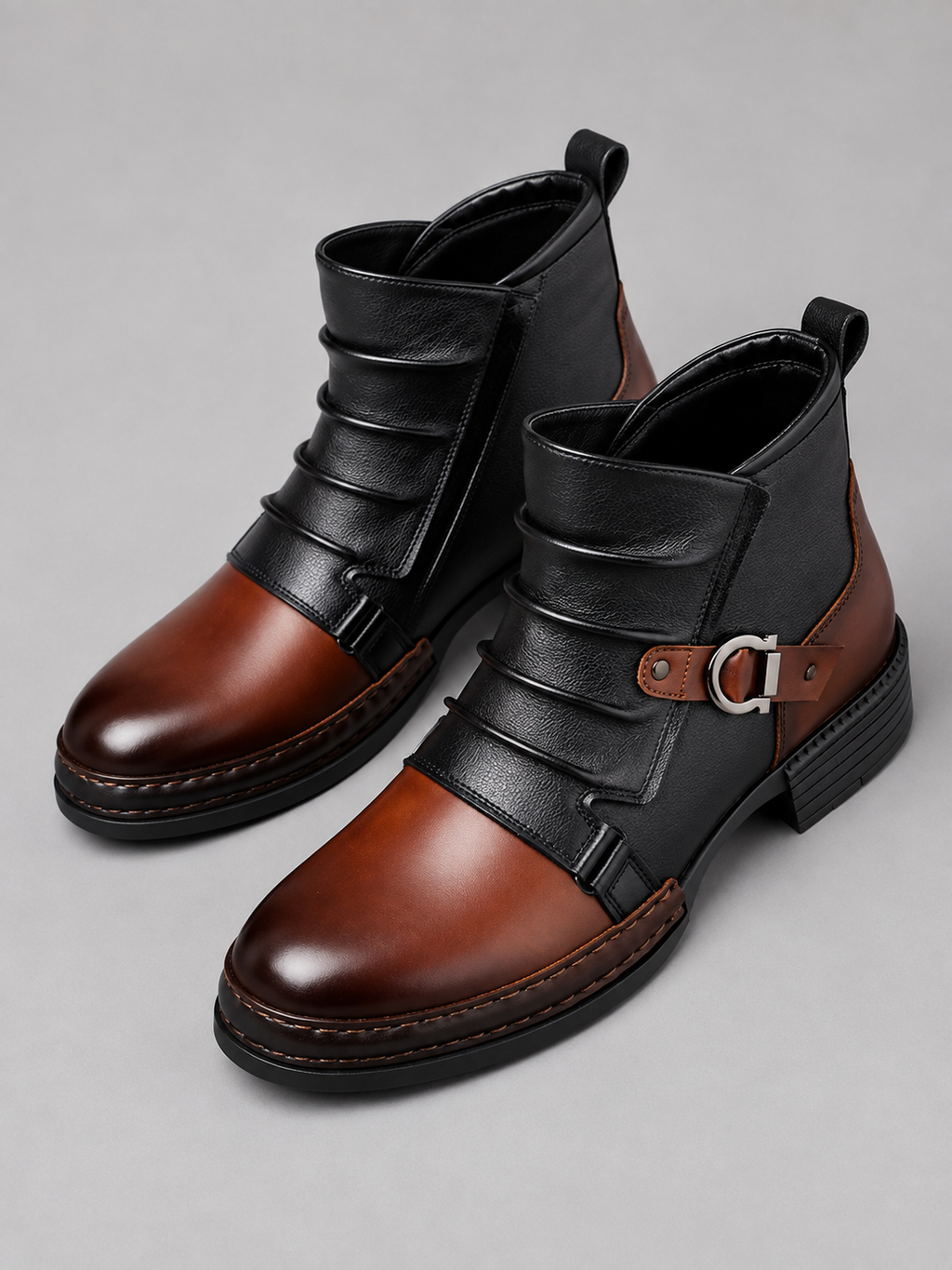 Brown men’s zip-up ankle motorcycle boots displayed on a plain background showing the full side profile and rugged sole